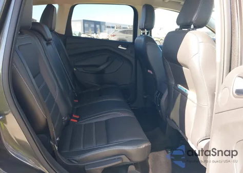 2018 Ford Escape Titanium z USA, uszkodzony, nr VIN 1FMCU0J95JUB36676